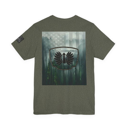 The Forest Duck Hunt Badge T-Shirt – Mossy Camo Print, Crossed Guns & Duck Skull Graphic